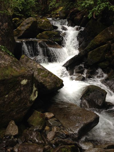 A waterfall crashing over rocks, near a lookout on Skywalk Trail in Whistler, British Columbia.