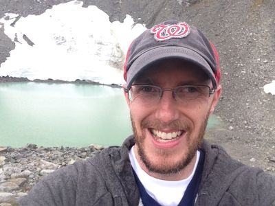 David Kennedy with a glacier in the background in Whistler, British Columbia – selfie style.