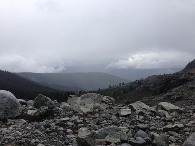 A view out into the valley, standing near one of the glacier lakes at Rainbow Mountain in Whistler, British Columbia.